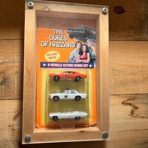 THE DUKES OF HAZZARD GENERAL LEE 1:64 SCALE 3 CAR CHASE SET BY ERTL NIB TM 1997